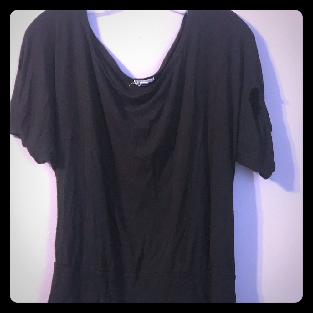 Black shirt loose and stretchy.